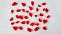 Rose petals scattered over white marble background, St. Valentine\'s Day card, Mother\'s day card Royalty Free Stock Photo