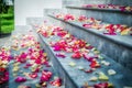 Rose petals on the stairs during the wedding ceremony