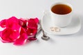 Rose petals and white parcelain Royalty Free Stock Photo