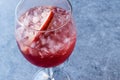 Rose Pink Blush Wine Cocktail with Pomegranate Seeds, Apple Slice and Crushed Ice. Royalty Free Stock Photo