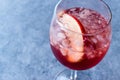 Rose Pink Blush Wine Cocktail with Pomegranate Seeds, Apple Slice and Crushed Ice. Royalty Free Stock Photo