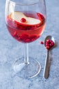 Rose Pink Blush Wine Cocktail with Pomegranate Seeds, Apple Slice and Crushed Ice. Royalty Free Stock Photo