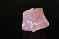 Rose Quartz Crystal on a Black Background. Royalty Free Stock Photo