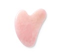 Rose quartz gua sha tool on white background, top view Royalty Free Stock Photo