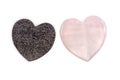 Rose quartz heart and black foam heart Royalty Free Stock Photo