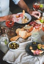 Rose wine, cheese, charcuterie, appetizers and mans hands holding food Royalty Free Stock Photo