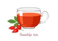 Rosehip tea in transparent glass cup. Healthy herbal tea.