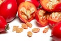 Rosehips  Rosa Canina fruits  ,cut in half seeds visible macro closeup detail, isolated on white background Royalty Free Stock Photo