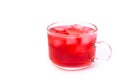 Red juice with ice cubes in glass isolated on white Royalty Free Stock Photo