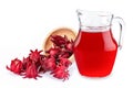 Fresh Jamaica sorrel flower  Rozelle, roselle or hibiscus sabdariffa  in wooden bowl and glass pitcher jug of roselle juice tea Royalty Free Stock Photo