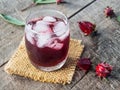 Roselle and roselle drink on wooden background