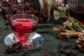 Roselle tea Jamaica sorrel, Rozelle or hibiscus sabdariffa  with dry roselle and brown cane sugar cube Royalty Free Stock Photo