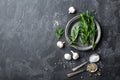 Rosemary, garlic, salt and white pepper, culinary background with various spices, directly above, flat lay Royalty Free Stock Photo