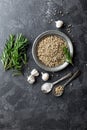 Rosemary, garlic, salt and white pepper, culinary background with various spices, directly above, flat lay Royalty Free Stock Photo