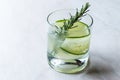 Rosemary Gin Gimlet Cocktail with Cucumber Slice.