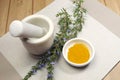 Rosemary herb and turmeric spice with mortar and pestle