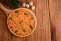 Rosemary and mushrooms near board with pizza Royalty Free Stock Photo