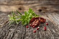 Rosemary with tomatoes, pepper and parsley on wooden background - Image