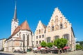 View at the Church of Our Lady and building of Town hall in the streets of Wasserburg am Inn in Germany