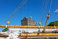 Rosenkrantz tower sticking up above the boom of the boat, Bergen, Norway