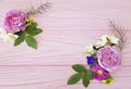 Roses beautiful bouquet design present season frame on a pink wooden background jasmine, magnolia Royalty Free Stock Photo