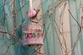 Roses and beautiful vintage bird's cage
