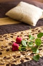 Roses on bed Royalty Free Stock Photo