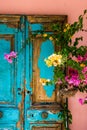 Peeling paintwork on an old door in Katakolon, Greece.