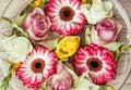 Roses and gerberas flowers in the glass bowl with water, holiday Royalty Free Stock Photo