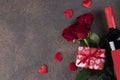 Roses, gifts and bottle of red wine, concept for Valentines Day, Top view, Copy space