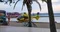 Roses, Girona, Spain- August 21, 2019: Yellow rescue helicopter on a beach