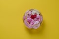 Roses on a glass vase, on a yellow background. flat lay still life concept Royalty Free Stock Photo