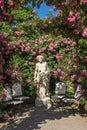 Roses and gods statue in the rose garden Beutig in Baden-Baden