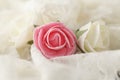 Roses made of material on a wedding gown