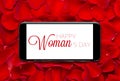 Roses with 8 march International Womans Day on Mobile screen.