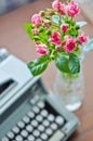 Roses and old type-writer Royalty Free Stock Photo
