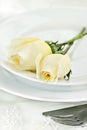 Roses and Place Setting Royalty Free Stock Photo