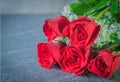 Roses red and white flowers Placed on stone table. Royalty Free Stock Photo