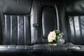 Roses at seat of newlywed limo