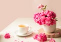roses and tea cup served for breakfast on plain background, copy space for text, valentine's day, wedding or Royalty Free Stock Photo