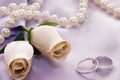 Roses and wedding rings Royalty Free Stock Photo