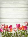 Roses on wooden background table. EPS 10