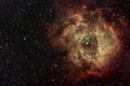 Rosette Nebula surrounded by stars Royalty Free Stock Photo