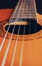 Rosette and strings of an acoustic guitar close up. Classical Spanish guitar. Musical instrument Royalty Free Stock Photo