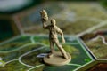Roseville, MN, USA, 02.04.2021 - Fallout Board Game Plastic Figure on Map Tiles