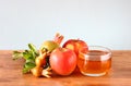 Rosh hashanah concept - apple honey and pomegranate over wooden table. Royalty Free Stock Photo