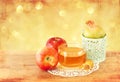 Rosh hashanah concept - apple honey and pomegranate over wooden table Royalty Free Stock Photo