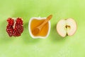 Rosh hashanah concept - honey, apples, pomegranate, symbols Royalty Free Stock Photo