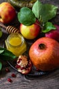 Rosh hashanah hashana - jewish new year holiday concept. Traditional symbols: honey, fresh apples, pomegranate and shofar Royalty Free Stock Photo