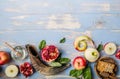 Rosh hashanah  Hashana - jewish New Year holiday concept. Traditional symbols: Honey jar and fresh apples with pomegranate and Royalty Free Stock Photo